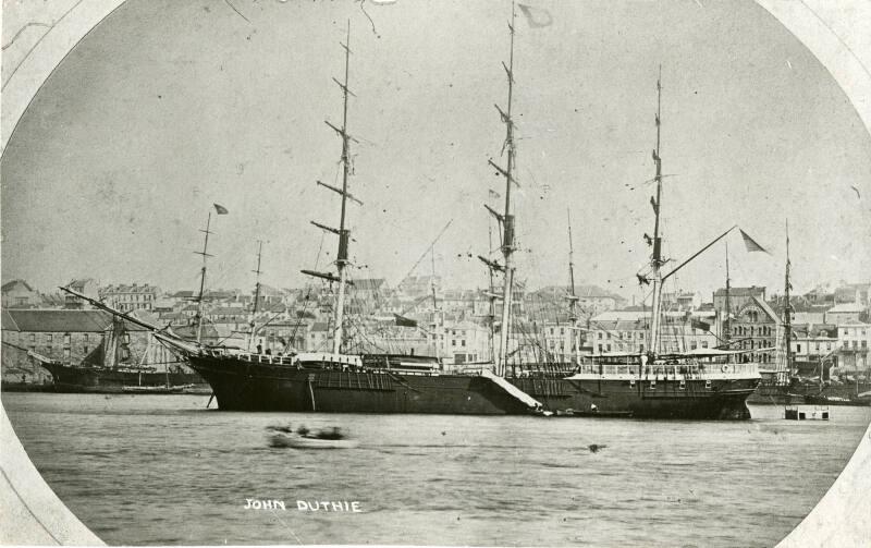 black and white Postcard showing the sailing ship 'John Duthie' at Circular Quay, Sydney, 1867