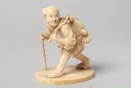 Japanese Carved Okimono Figure of a Crouching Man