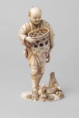 Japanese Carved Okimono Figure of a Man with Rabbits