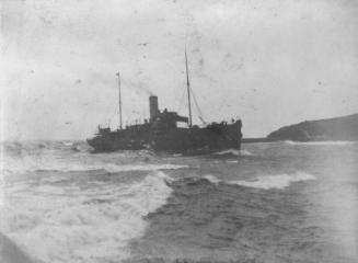 Black/white photograph showing starboard side of the cargo and passenger steamship 'Hogarth' as…