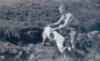 Alexander T. Mackay Playing with Dog