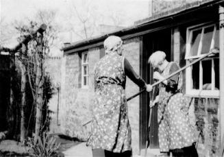 Women Washing Windows