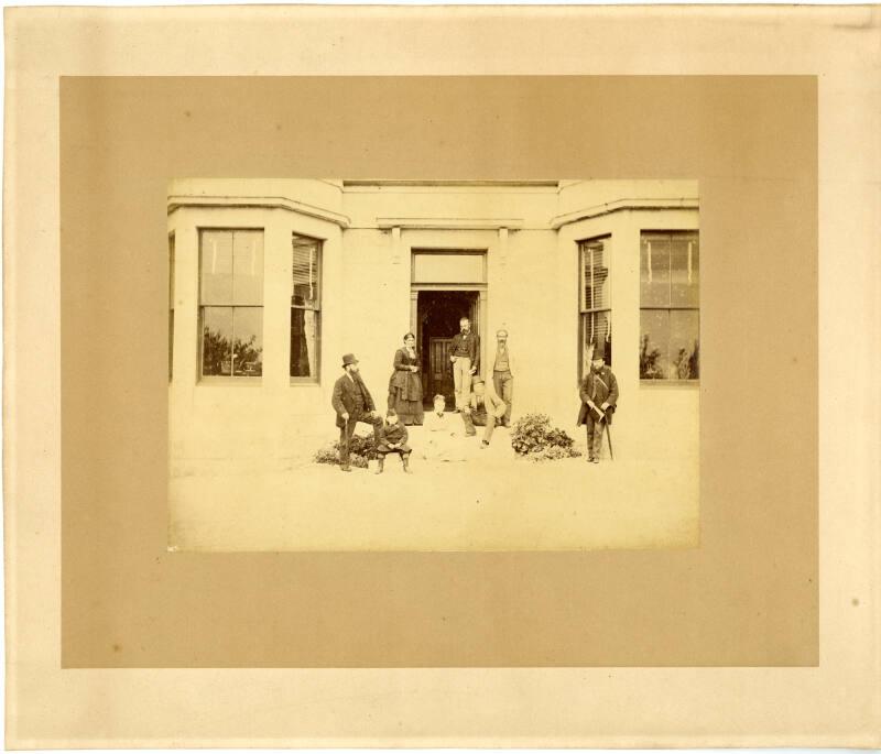 Adults And Children At Doorway