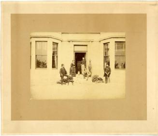 Adults And Children At Doorway