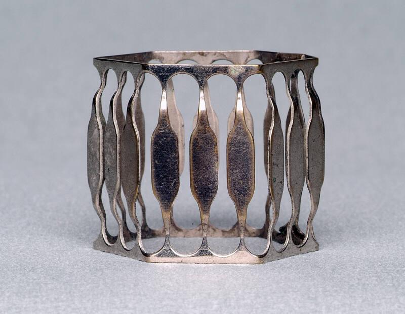 Six sided napkin ring with elongated cutouts