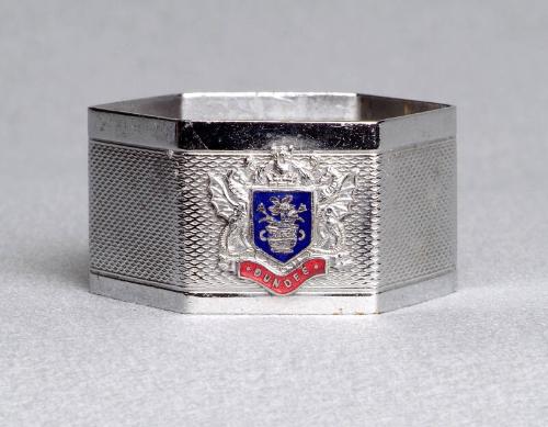 Chrome plated hexagonal napkin ring with Dundee crest