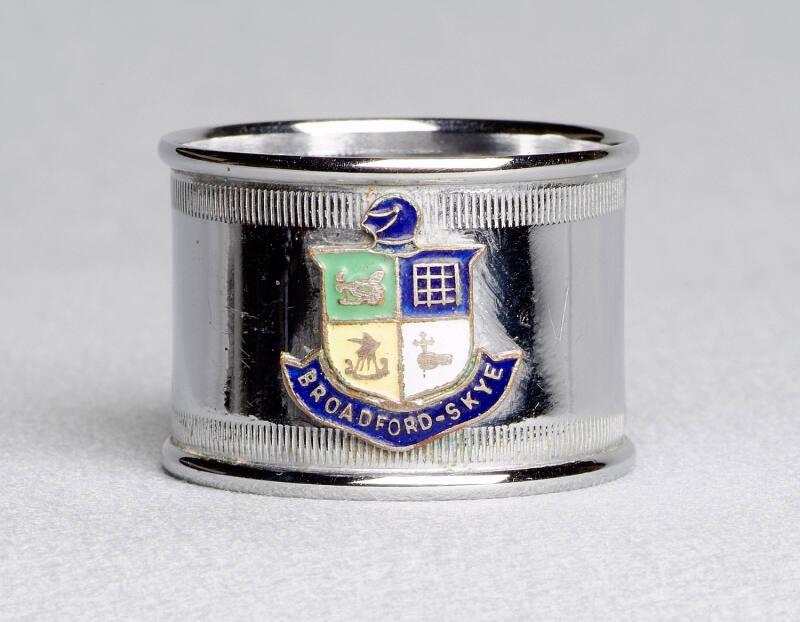 Chrome plated napkin ring with broadford crest