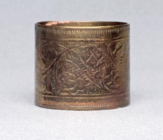 Brass napkin ring with floral design