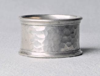 Pewter napkin ring with thrown edges