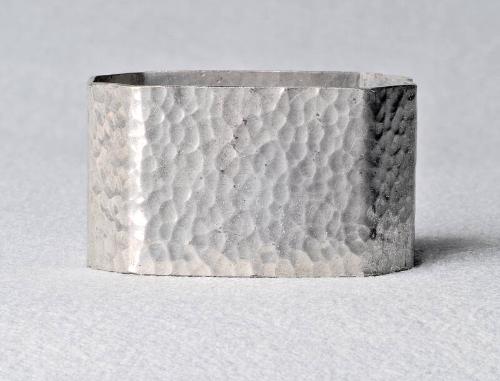 Angled oblong pewter napkin ring