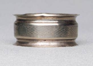 EPNS napkin ring with outer curving flanges
