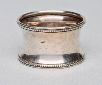 Pair of concave silver plated napkin rings.