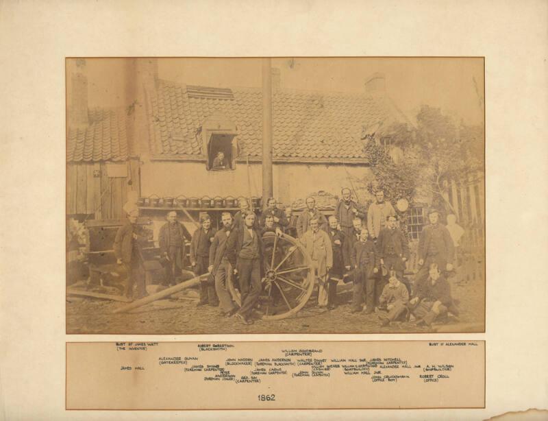 Photograph of workers of Alexander Hall Shipyard Standing in Front of Buildings, framed