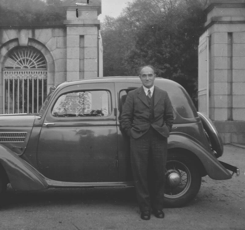 Man Standing by Car