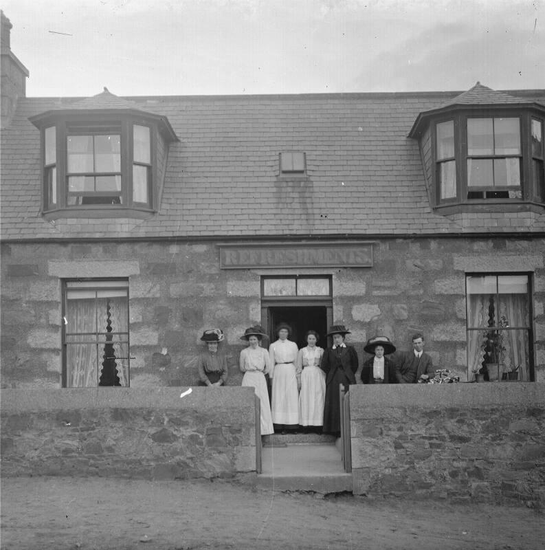 Group at Doorway of Refreshment Shop