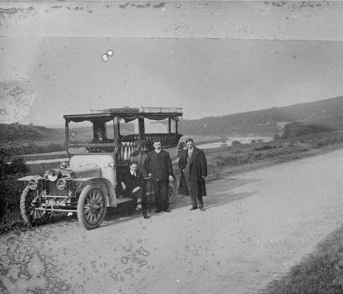 Men Standing by Charabanc