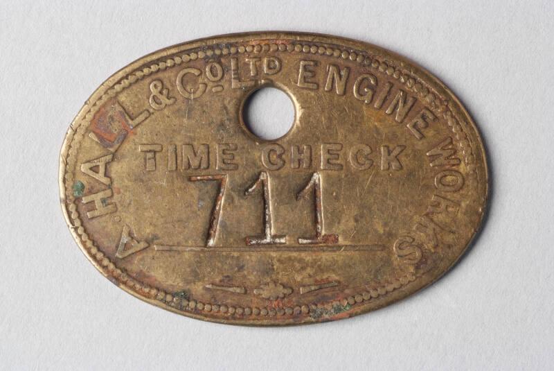 Timecheck Disk from Alexander Hall and Co. Engine Works, timecheck number 711