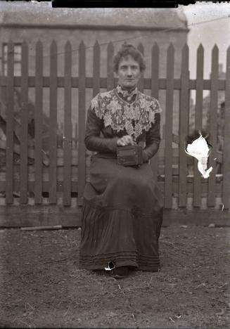 Women with Camera Seated in Garden Member of Dr Walford Bodie's Family?/Friend ?