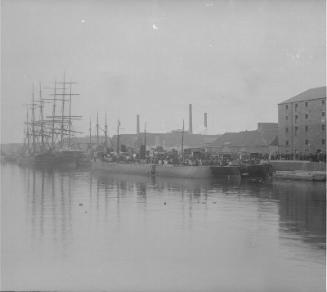 Glass plate showing three steamships (Angler, Sturgeon and another) and two sailing vessels, one called Mark Twain, possibly in Aberdeen Harbour