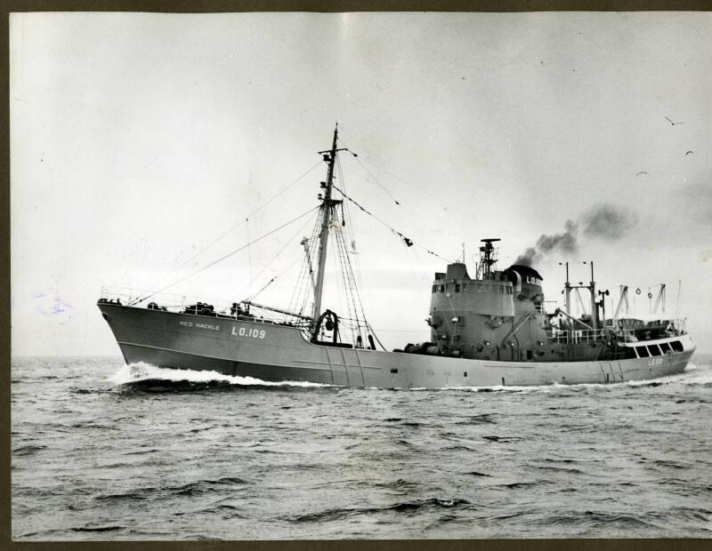 Photograph in album showing trawler Red Hackle
