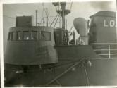 Photograph in album showing trawler Red Hackle
