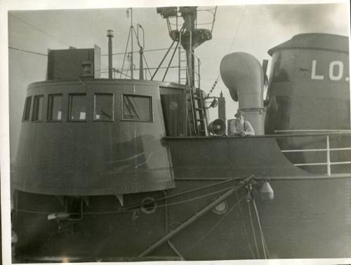 Photograph in album showing trawler Red Hackle
