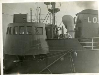 Photograph in album showing trawler Red Hackle
