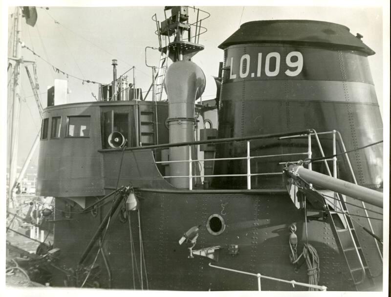 Photograph in album showing trawler Red Hackle
