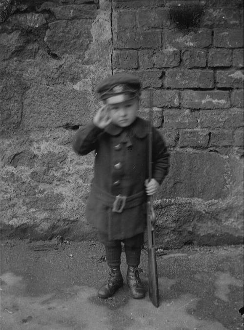 Boy with Toy Rifle