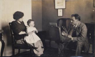 James McBey Painting a Mother and Child (Photograph Album Belonging to James McBey)