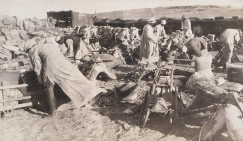 Loading Saddle Bags (Photograph Album Belonging to James McBey)