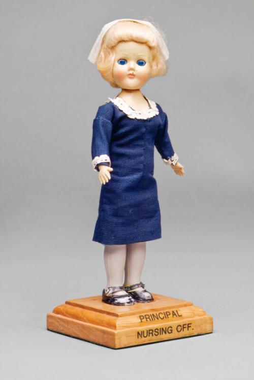 Doll Dressed As A Principal Nursing Officer (PNO)