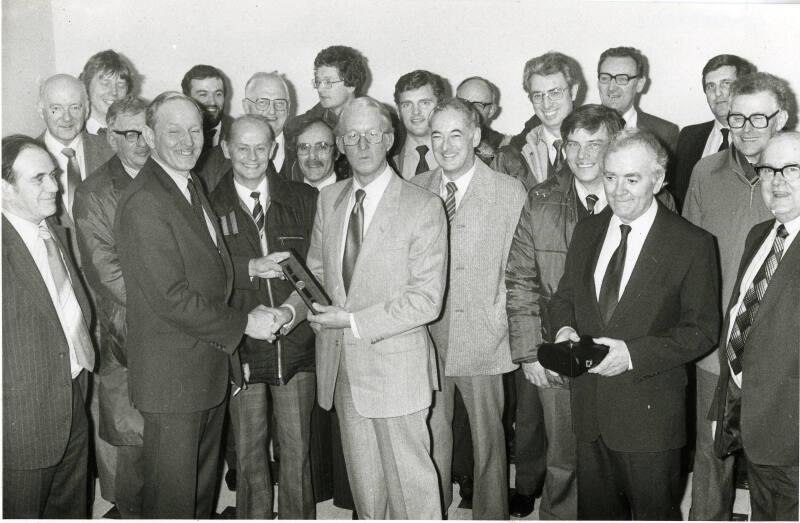 Hall Russell staff retirement presentation group photograph