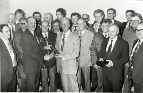 Hall Russell staff retirement presentation group photograph