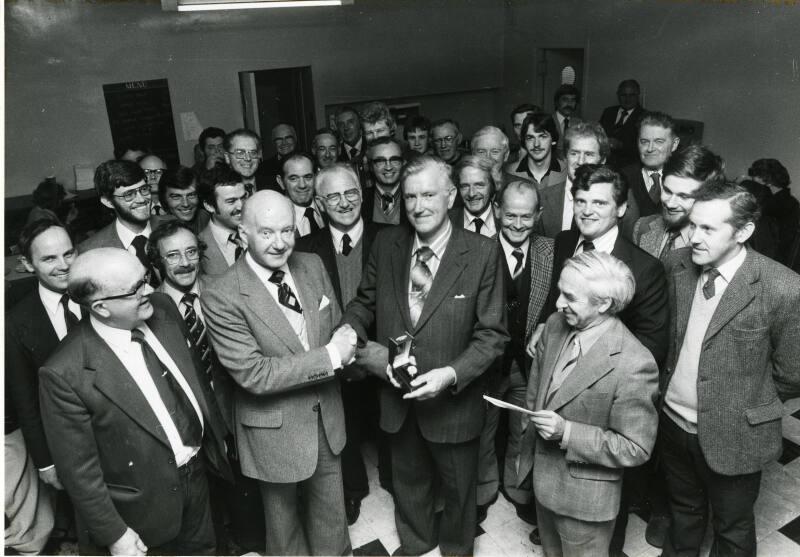 Hall Russell staff retirement presentation group photograph