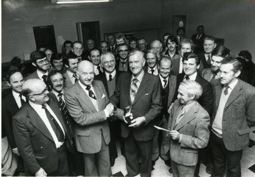 Hall Russell staff retirement presentation group photograph