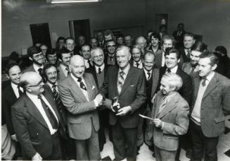 Hall Russell staff retirement presentation group photograph