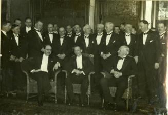 Black and White photograph of James Ross Melville, naval architect with managers from the North Boats company