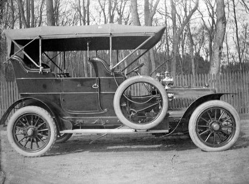 Motor car Parked by Woodland