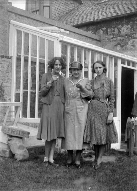 Three Women Standing Outdoors