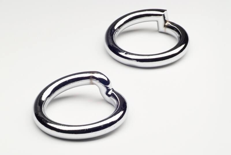 Pair Of Polished Plate Steel Bangles
