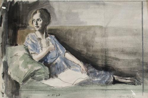 Woman Reclining on Couch with an Open Book on Her Lap