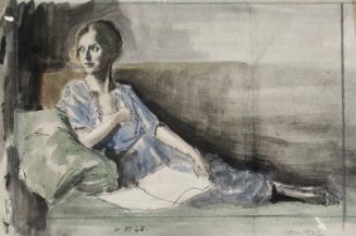 Woman Reclining on Couch with an Open Book on Her Lap