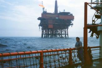 Colour photograph of Murchison Platform with boom flaring