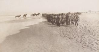 Soldiers Marching in Formation (Photograph Album Belonging to James McBey)