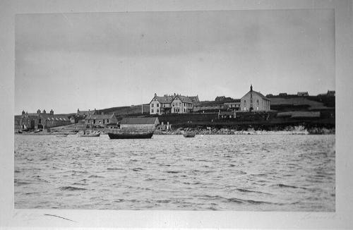 glass positive showing the exterior of the St Magnus Hotel, Hillswick, Shetland, owned by the N…