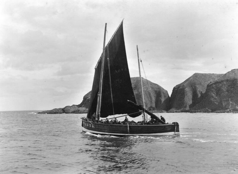 Fifie, a.674, under sail, leaving stonehaven harbour