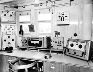 Black and white photograph showing interior of  the Discovery