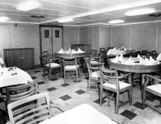 Black and white photograph showing interior of  the Discovery