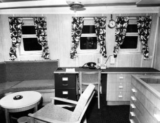 Black and white photograph showing interior of  the Discovery